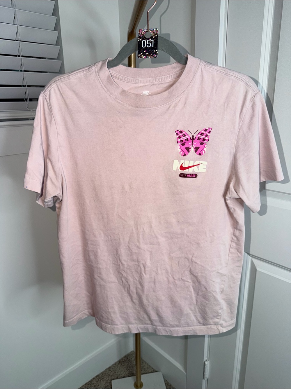 51. Nike Sportswear Women's Graphic Boyfriend T-Shirt in Platinum Violet